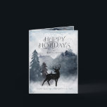 Carte de vacances pliée rustique bleu hiver<br><div class="desc">Notre carte de vacances ''rustique bleu hiver'' présente une superbe scène aquarelle représentant une forêt enneigée avec des silhouettes d'animaux au premier plan. La police est décorative mais sophistiquée et peut être facilement personnalisée. Cette carte est pliable et à l'intérieur, vous trouverez que vous pouvez personnaliser la photo ainsi que...</div>