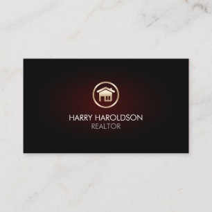 Carte de visite avec icône de maison en or pour ré
