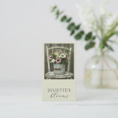 Carte de visite d'une fleuriste créatrice florale  (Debout devant)