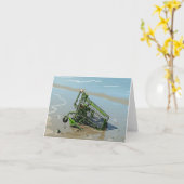 Carte de vœux avec chariot de courses dans la boue (Fleur jaune)