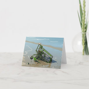 Carte de vœux avec chariot de courses dans la boue