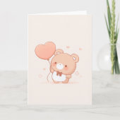 Carte de vœux avec un ours mignon et un ballon en  (Devant)