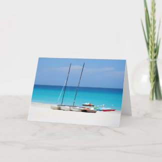 Carte de voeux avec une scène de plage tropicale