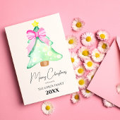 Carte de vœux de fêtes avec un arbre de Noël et un