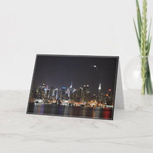 Carte de vœux de la skyline de la ville de nuit av