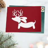 Carte de voeux de vacances de teckel de renne