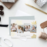Carte De Vœux En Aluminium Snowdrop 4 Photo Collage Joyeux Noël<br><div class="desc">Unique design moderne carte de vacances avec quatre photos préférées arrangées côte à côte avec des silhouettes surdimensionnées de flocon doré dans l'arrière - plan. Personnalisez avec votre salutation de vacances personnalisée et le ou les nom(s) de famille sous la lettre classique; montré avec "Joyeux Noël".</div>