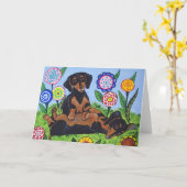 Carte de voeux espiègle de teckels (Fleur jaune)