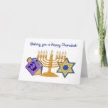 Carte de voeux heureuse de Chanukah<br><div class="desc">Aimant " vous souhaitant Hanoukka heureux" avec un dreidle,  un menorah et une étoile de David dans des couleurs lumineuses. Texte intérieur : "Chez Chanukah nous nous rappelons la tradition,  la liberté,  et le courage. Ayez une célébration joyeuse du festival des lumières."</div>