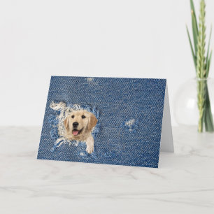 Carte de vœux Retriever doré dans un trou de denim