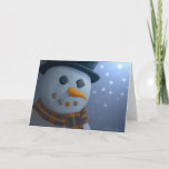 Carte de voeux Snowman<br><div class="desc">Envoyez à vos Joyeuses Fêtes cette carte de voeux vierge d'hiver qui présente un gros plan d'un bonhomme de neige contre un arrière - plan bleu neigeux.</div>