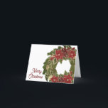 Carte de voeux Vintage Christmas Poinsettias Wreat<br><div class="desc">Cet élégant design vintage comprend une couronne de Noël ornée de poinsettias. Cliquez sur le bouton personnaliser pour plus de flexibilité dans la modification du texte et des graphiques! Des variantes de cette conception ainsi que des produits de coordination sont disponibles dans notre boutique, zazzle.com/store/doodlelulu. Contactez-nous si vous avez besoin...</div>