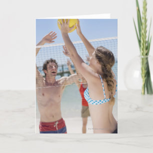 Carte Des amis jouent au volley sur la plage