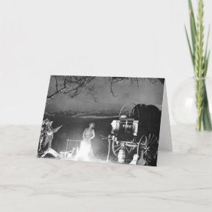 Carte Des cowboys jouent et chantent autour d'un feu de 