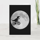 Carte Dinosaure sur un vélo dans le ciel avec la lune (Devant)