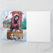 Carte Doberman dans une maison de Noël enneigée pour chi (Intérieur)