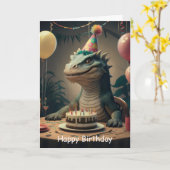 Carte Dragon de Komodo assis à une table avec un gâteau  (Fleur jaune)