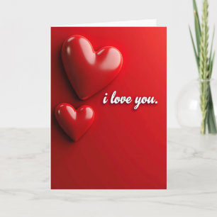 Carte en faux papier doré à cœurs rouges