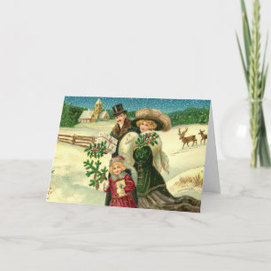 Carte Famille victorienne dans la scène de Noël enneigée