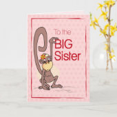 Carte Félicitations à la Grande Soeur, singe sur rose (Fleur jaune)