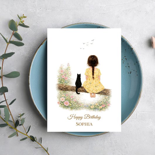 Carte Fille et chat noir sur une branche
