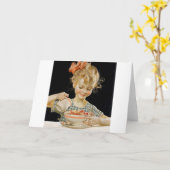 Carte Fille mangeant le petit déjeuner (Fleur jaune)