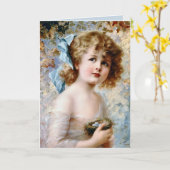 Carte Fille tenant un nid (Fleur jaune)