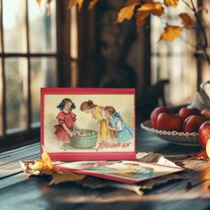 Carte Filles d'Halloween vintage se disputant des pommes