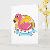 Carte Flamant rose à la baignade avec bouée (Fleur jaune)