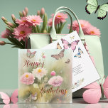Carte Fleurs printanières et aquarelle papillon Annivers<br><div class="desc">🦋 Ajoutez une tranche de magie printanière à votre cadeau! Notre carte d'anniversaire est ornée de papillons gracieux et de fleurs printanières douces dans un cadre vert calme. C'est comme donner un éclat de la beauté de la nature. Mais voici le kicker - le voeu d'anniversaire est sur le dos,...</div>