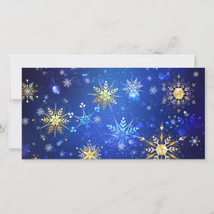 Carte Fond bleu de Noël avec flocons d'or
