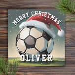 Carte Football Football Ball Santa Hat Joyeux Noël<br><div class="desc">Football Football Bal Santa Chapeau Nom Joyeux Carte de Noël. Le design a un ballon de football avec un chapeau de Père Noël rouge. Personnalisez avec votre nom. Vous pouvez modifier le texte Joyeux Noël.</div>
