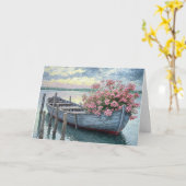 Carte Géraniums roses dans une barque en bois Sympathie (Fleur jaune)