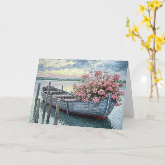 Carte Géraniums roses dans une barque en bois Sympathie (Fleur jaune)