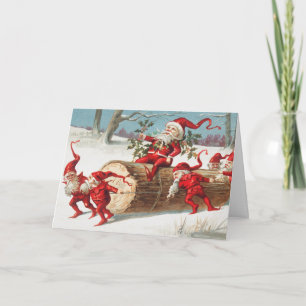 Carte Gnomes dragging a cut tree trunk through the snow