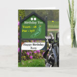 Carte Golf 18th Birthday Card - 'Birthday Tee'<br><div class="desc">Carte de 18e anniversaire sur le thème du Golf sur mesure. Envoyez les voeux d'anniversaire du Tee d'anniversaire, avec un panneau de golf qui peut être personnalisé, pendant des années et le nom. La photographie sportive d'un trou de golf et de son drapeau, le vert étant au loin derrière un...</div>