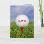 Carte Golf Ball On Tee for Sister<br><div class="desc">Fermer la balle de golf sur le tee rouge dans l'herbe verte pour l'anniversaire de soeur. Le texte sur la bille peut être modifié.</div>