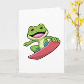 Carte Grenouille en snowboardeur avec snowboard (Fleur jaune)