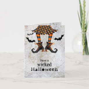 Carte Halloween méchant des jambes de sorcière