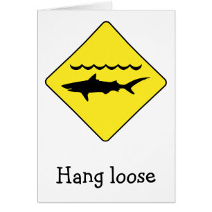 Carte "Hang Loose" sur le panneau jaune "AVERTISSE