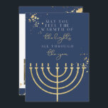 Carte Hanoukka Marine Blue Gold Foil Menorah<br><div class="desc">Cette carte de voeux Hanoukka présente un arrière - plan bleu marine, des plaques de papier doré, une menorah dorée et le dicton "Que vous sentiez la chaleur des lumières tout au long de l'année" en l'honneur de la fête des lumières. Modifiez facilement le libellé *most* et mettez à jour...</div>