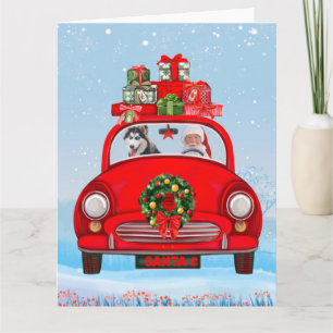 Carte Husky sibérien en voiture avec le Père Noël