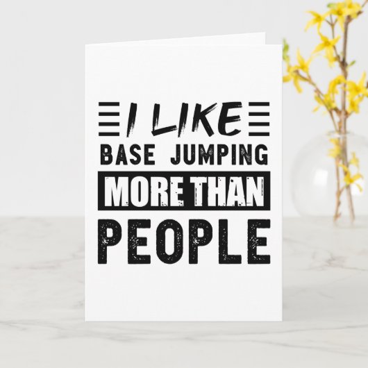 Carte J'aime le saut en base jump plus que les gens drôl (Fleur jaune)