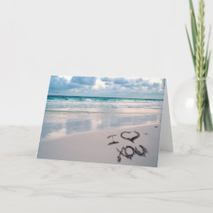 Carte Je t'aime, écriture de sable sur la plage