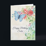 Carte Joyeux anniversaire, papillon et fleurs<br><div class="desc">Cette jolie carte d'anniversaire a un aspect aquarelle. En haut à gauche se trouve un papillon bleu clair. Il survole des fleurs dont une rose rose rose, des marguerites et des fleurs bleues. Il y a aussi des feuilles vert clair et de jolies vignes jumelantes. Tout le texte peut être...</div>