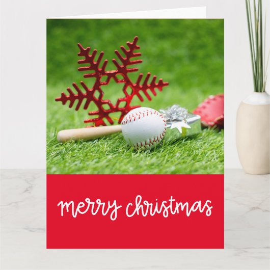 Carte Joyeux Noël de baseball avec balle et flot de neig (Devant)