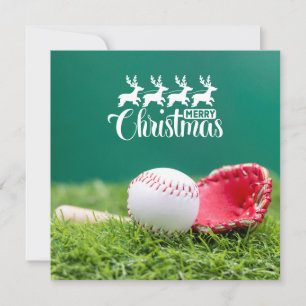 Carte Joyeux Noël de baseball avec cadeaux d'herbe verte