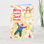 Carte Joyeux Noël Grand-fils Snowman Angels hiver<br><div class="desc">Joyeux voeux de Noël à un petit-fils sucré décoré d'un jeune garçon faisant des anges de neige avec un bonhomme souriant de neige et de neige tombant illustrée par l'aquarelle. A l'intérieur, un bleu chaud est présent. Vous pouvez modifier la couleur intérieure et le texte pour répondre à vos besoins....</div>