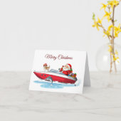 Carte Joyeux Noël Père Noël sur le bateau avec chien  (Fleur jaune)