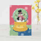 Carte Joyeux Noël Snowman Globe (Fleur jaune)